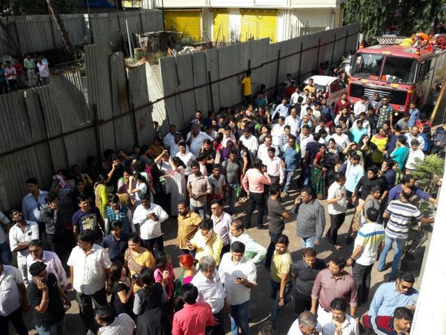 150 residents of the high-rise at Hari Niwas were evacuated safely. Fire department officials said the fire started in the electric duct between the third and fourth floors of the building. (Praful Gangurde)