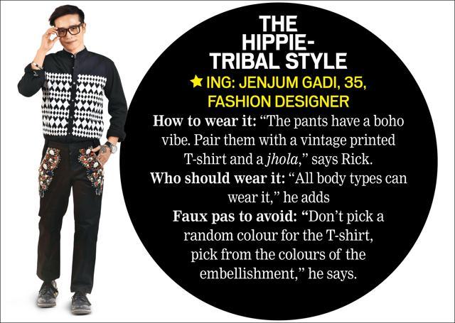 Jenjum wears an applique embroidery shirt and embellished trousers from his collection, watch from Issey Miyake, glasses from RayBan, silver band of his own and shoes from Prada (Raj K Raj)
