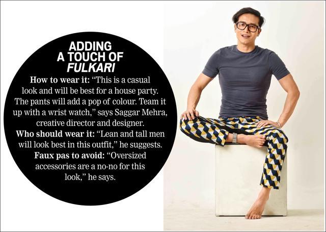 Jenjum wears a T-shirt from H&amp;M, fulkari embroidered pants from his own collection, anklet from Nimai and reading glasses from RayBan (Raj K Raj)