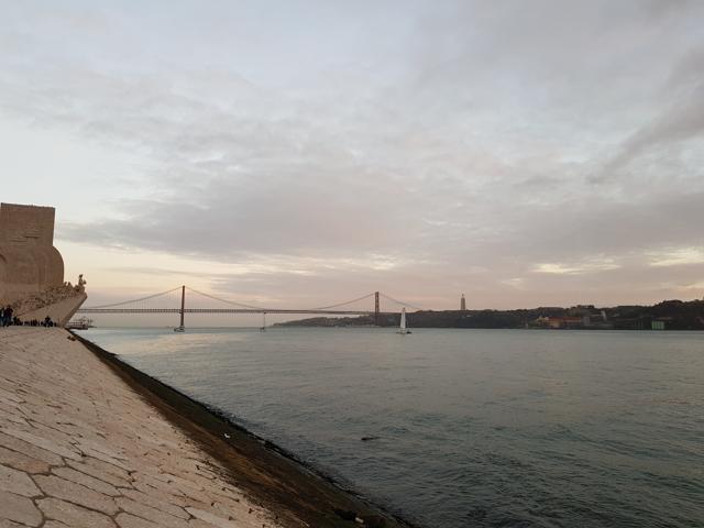 Ponte 25 de Abril bridge is visible from the river bank in Belem. In the distance stands Christ the King. (Picture courtesy: Abhimanyu/Am Klicks) Ponte 25 de Abril bridge is visible from the river bank in Belem. In the distance stands Christ the King. (Picture courtesy: Abhimanyu/Am Klicks)