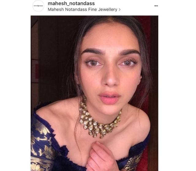 Aditi wore nude lips, some eyeliner and mascara and swept her hair back and a polki choker. (Instagram/ mahesh_notandass) Aditi wore nude lips, some eyeliner and mascara and swept her hair back and a polki choker. (Instagram/ mahesh_notandass)