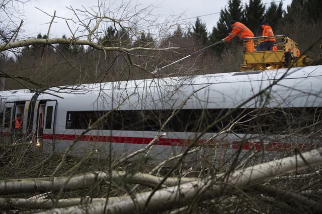 An ICE train of the Deutsche Bahn, is stopped on the track between Hannover and Goettingen near the village of Lamspringe, Germany. (AP Photo) An ICE train of the Deutsche Bahn, is stopped on the track between Hannover and Goettingen near the village of Lamspringe, Germany. (AP Photo)