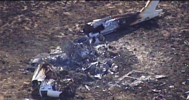 This frame from video provided by KOAT-TV shows the wreckage of a helicopter that crashed in a mountainous rural area of northern New Mexico, killing five people, including Zimbabwe opposition leader Roy Bennett. (AP) This frame from video provided by KOAT-TV shows the wreckage of a helicopter that crashed in a mountainous rural area of northern New Mexico, killing five people, including Zimbabwe opposition leader Roy Bennett. (AP)