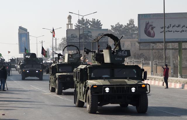 Afghan security personnel leave the Intercontinental Hotel after an attack in Kabul. (AFP Photo)