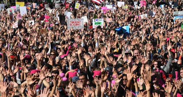 Protesters, part of a 500,000 strong crowd, attend the Women's Rally on the one-year anniversary of the first Women's March in Los Angeles, California on January 20, 2018. (AFP) Protesters, part of a 500,000 strong crowd, attend the Women's Rally on the one-year anniversary of the first Women's March in Los Angeles, California on January 20, 2018. (AFP)