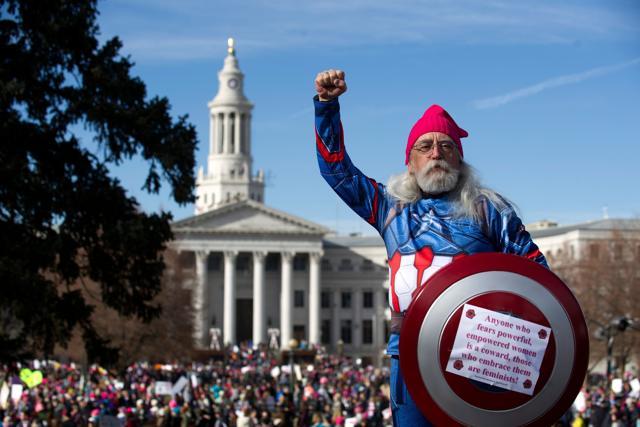 Ron Booth of Westminster, Colorado is dressed as "A Captain America" pumps his fist during the Denver's Women's March at the Civics Center Park in Denver. (AFP Photo) Ron Booth of Westminster, Colorado is dressed as "A Captain America" pumps his fist during the Denver's Women's March at the Civics Center Park in Denver. (AFP Photo)