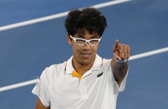 South Korea's Chung Hyeon celebrates winning his match against Serbia's Novak Djokovic. (REUTERS)