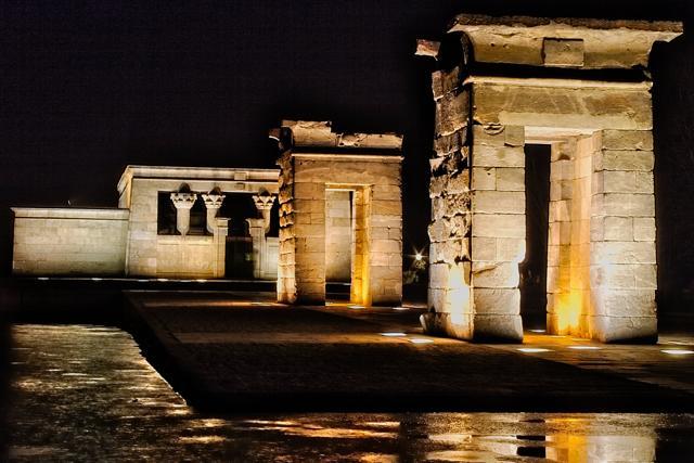 Templo de Debod was originally built in Egypt, dismantled and reconstructed in Madrid. Parque de Oeste, where the ancient temple is placed, is the perfect spot for a stunning view of the Royal Palace at sunset. Templo de Debod was originally built in Egypt, dismantled and reconstructed in Madrid. Parque de Oeste, where the ancient temple is placed, is the perfect spot for a stunning view of the Royal Palace at sunset.