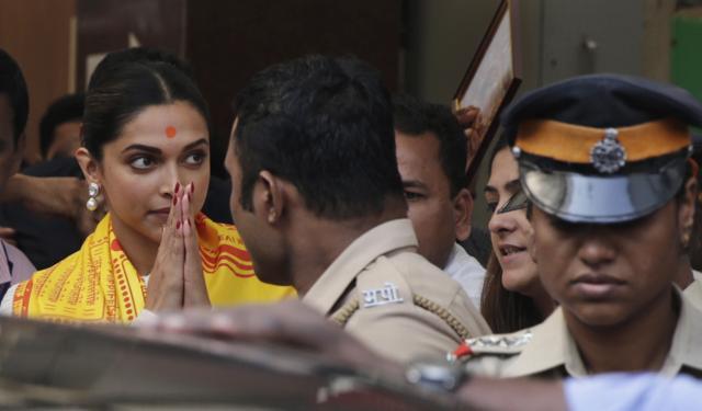 Actress Deepika Padukone after offering prayers at the Siddhivinayak temple in Mumbai on Tuesday ahead of the release of her movie, Padmaavat. (AP Photo) Actress Deepika Padukone after offering prayers at the Siddhivinayak temple in Mumbai on Tuesday ahead of the release of her movie, Padmaavat. (AP Photo)