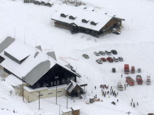 Fire trucks and ambulances are parked at a ski resort in Kusatsu, central Japan, after Mount Kusatsu-Shirane erupted Tuesday. (AP Photo) Fire trucks and ambulances are parked at a ski resort in Kusatsu, central Japan, after Mount Kusatsu-Shirane erupted Tuesday. (AP Photo)