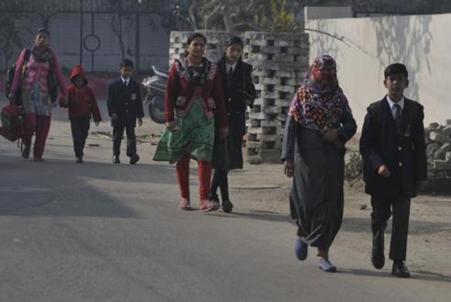 Many parents were also seen discussing the issue with others who came to drop their child to school. (HT) Many parents were also seen discussing the issue with others who came to drop their child to school. (HT)