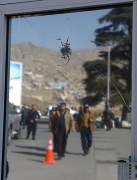 A bullet hole is seen at the entrance gate of a security check room at the Intercontinental Hotel in Kabul on January 23, 2018 following an attack by Taliban militants who killed at least 22 people. (AFP) A bullet hole is seen at the entrance gate of a security check room at the Intercontinental Hotel in Kabul on January 23, 2018 following an attack by Taliban militants who killed at least 22 people. (AFP)