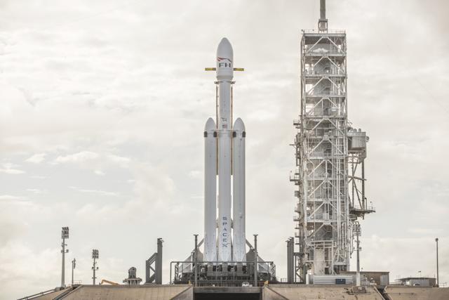 This Dec. 28, 2017 photo made available by SpaceX shows a Falcon Heavy rocket at Cape Canaveral, Fla. (AP) This Dec. 28, 2017 photo made available by SpaceX shows a Falcon Heavy rocket at Cape Canaveral, Fla. (AP)