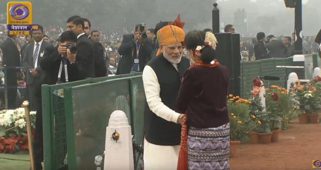 PM Modi welcomes Muanmar leader Aung San Suu Kyi at Rajpath. (Doordarshan screengrab)