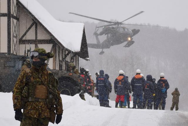 A helicopter from Japan's Self-Defence Force at a ski resort during a rescue operation after the volcanic eruption of Mount Kusatsu-Shirane in Kusatsu town, Gunma prefecture on January 23. (AFP) A helicopter from Japan's Self-Defence Force at a ski resort during a rescue operation after the volcanic eruption of Mount Kusatsu-Shirane in Kusatsu town, Gunma prefecture on January 23. (AFP)