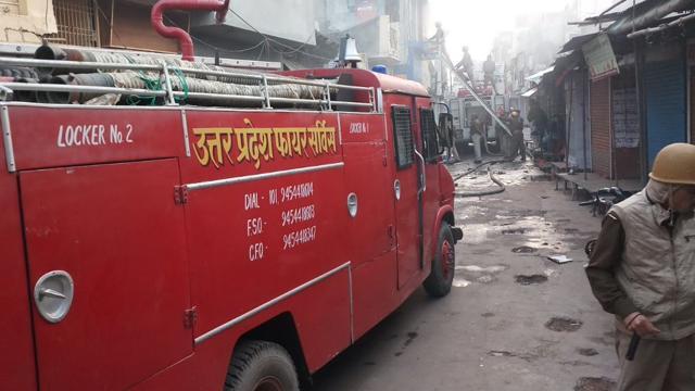 Fire brigade personnel try to douse a blaze at a shoe shop in Baradwari area of Kasganj on Saturday. (ANI Twitter) Fire brigade personnel try to douse a blaze at a shoe shop in Baradwari area of Kasganj on Saturday. (ANI Twitter)