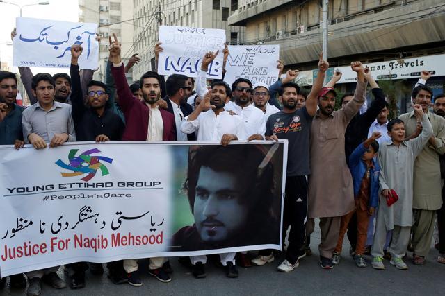 People chant slogans and hold signs as they condemn the death of Naqibullah Mehsud, whose family said he was killed by police in a so-called "encounter killing", during a protest in Karachi, Pakistan January 21, 2018. (REUTERS) People chant slogans and hold signs as they condemn the death of Naqibullah Mehsud, whose family said he was killed by police in a so-called "encounter killing", during a protest in Karachi, Pakistan January 21, 2018. (REUTERS)