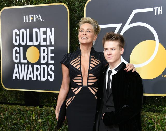 Sharon Stone and Roan Joseph Bronstein arrive for the 75th Golden Globe Awards on January 7. (AFP) Sharon Stone and Roan Joseph Bronstein arrive for the 75th Golden Globe Awards on January 7. (AFP)