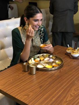 Deepika Padukone feasts on a Rajasthani thali to celebrate the success of her recently released film in Mumbai on Jan 27. (IANS) Deepika Padukone feasts on a Rajasthani thali to celebrate the success of her recently released film in Mumbai on Jan 27. (IANS)
