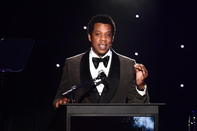 American rapper and businessman, Shawn Corey Carter, known professionally as JAY-Z, acknowledges his Industry Icon award during the traditional Clive Davis party. (AFP) American rapper and businessman, Shawn Corey Carter, known professionally as JAY-Z, acknowledges his Industry Icon award during the traditional Clive Davis party. (AFP)