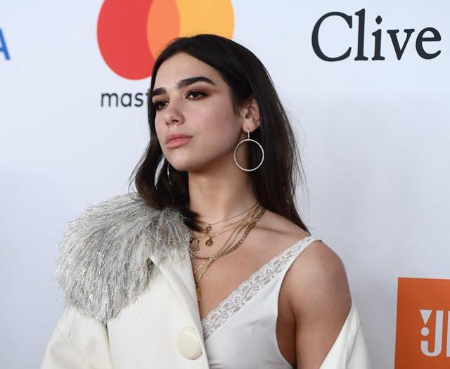 English singer, songwriter, and model Dua Lipa arrives for the traditional Clive Davis party. (AFP) English singer, songwriter, and model Dua Lipa arrives for the traditional Clive Davis party. (AFP)