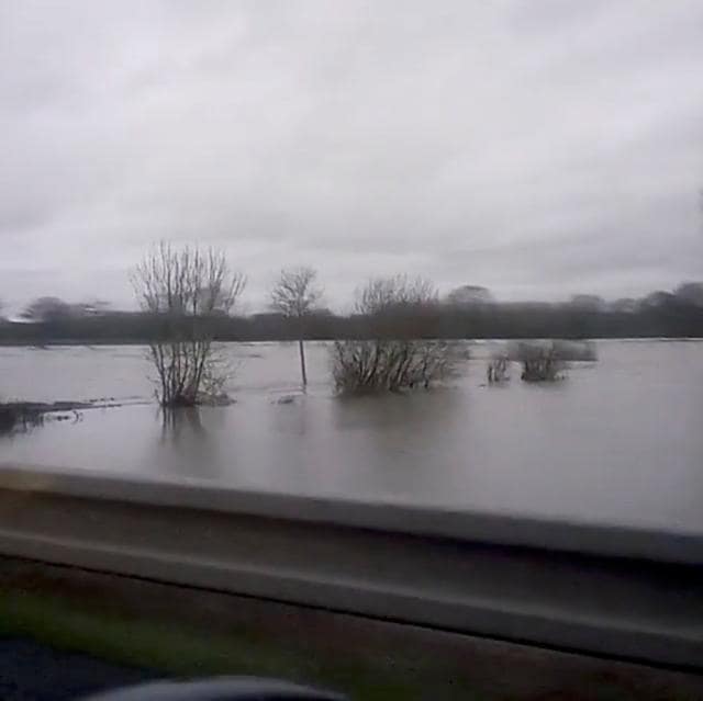 Fields are seen under water from a car, in Ducey, Normandy, France, January 23, 2018 in this still image taken from a video obtained from social media. (REUTERS) Fields are seen under water from a car, in Ducey, Normandy, France, January 23, 2018 in this still image taken from a video obtained from social media. (REUTERS)