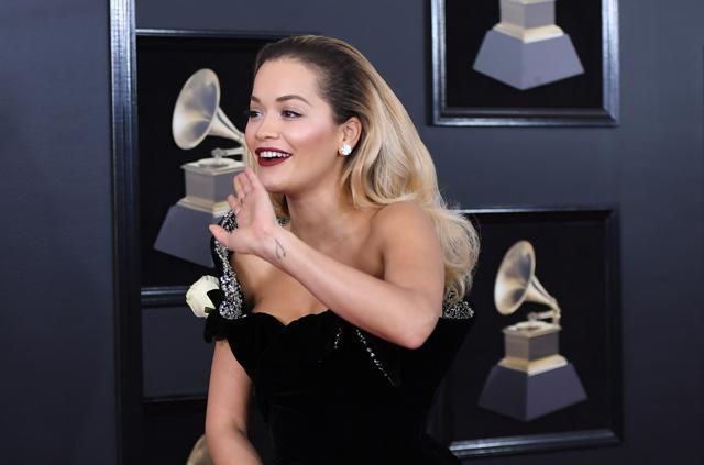 Rita Ora wowed in black, a gown with a silver embellished lining open on one side to the hip. (AFP) Rita Ora wowed in black, a gown with a silver embellished lining open on one side to the hip. (AFP)