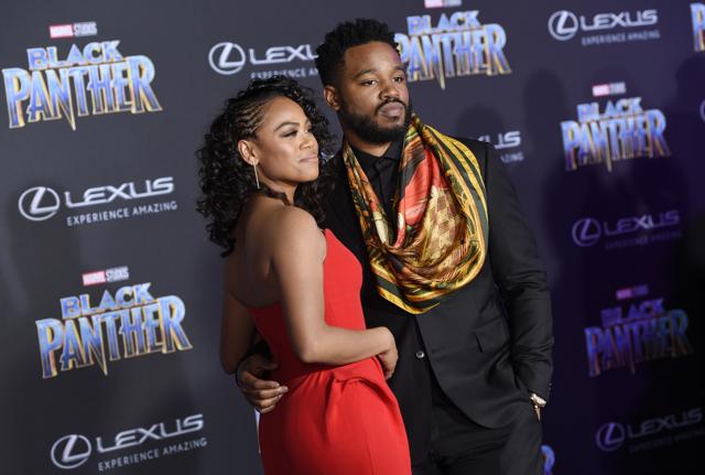 Ryan Cogler, right, director/co-writer of Black Panther, poses with his wife Zinzi Evans at the premiere of the film at The Dolby Theatre on Monday. (Chris Pizzello/Invision/AP)