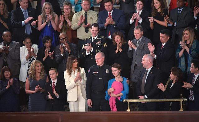 US First Lady Melania Trump (C-L) and the audience applaud during Donald Trump's State of the Union address in the House Chamber of the US Capitol in Washington, DC. (AFP) US First Lady Melania Trump (C-L) and the audience applaud during Donald Trump's State of the Union address in the House Chamber of the US Capitol in Washington, DC. (AFP)