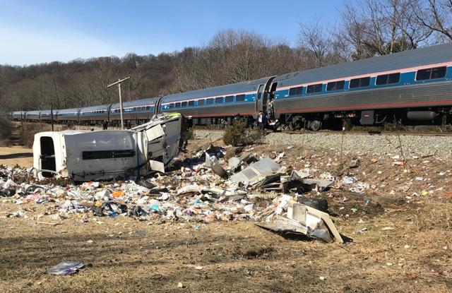 The passenger train carrying Republican members of the US Congress from Washington to a retreat in West Virginia that collided with a garbage truck in Crozet, Virginia. (REUTERS) The passenger train carrying Republican members of the US Congress from Washington to a retreat in West Virginia that collided with a garbage truck in Crozet, Virginia. (REUTERS)