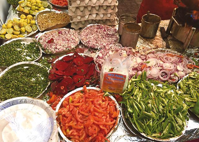 The toppings for ‘Pizza Omelet’ include everything from tomatoes to peppers and cheese The toppings for ‘Pizza Omelet’ include everything from tomatoes to peppers and cheese