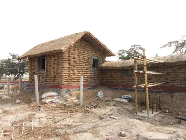 It took more time and money than we had anticipated, but our house is up, and it’s exactly as we’d wanted it. The walls are made from earth bags strung together with jute rope. It took more time and money than we had anticipated, but our house is up, and it’s exactly as we’d wanted it. The walls are made from earth bags strung together with jute rope.
