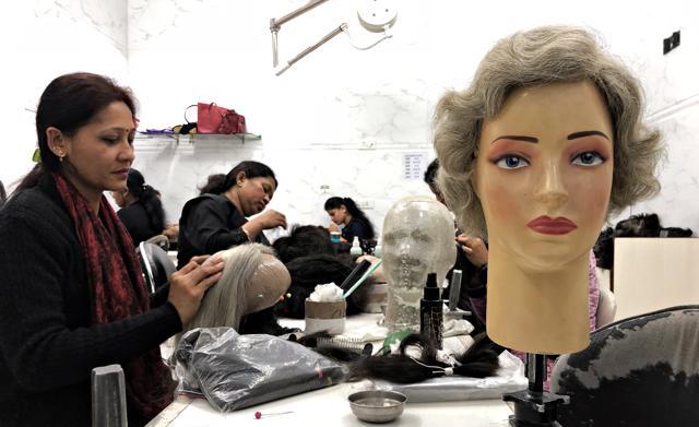 Workers making wigs for cancer patients, who have lost hair due to their treatment. (Jasjeet Plaha/Hindustan Times)