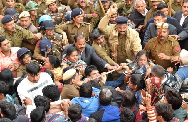 Family of deceased Rocky Gulia during a protest in Rohtak on Saturday. (Manoj Dhaka/HT) Family of deceased Rocky Gulia during a protest in Rohtak on Saturday. (Manoj Dhaka/HT)