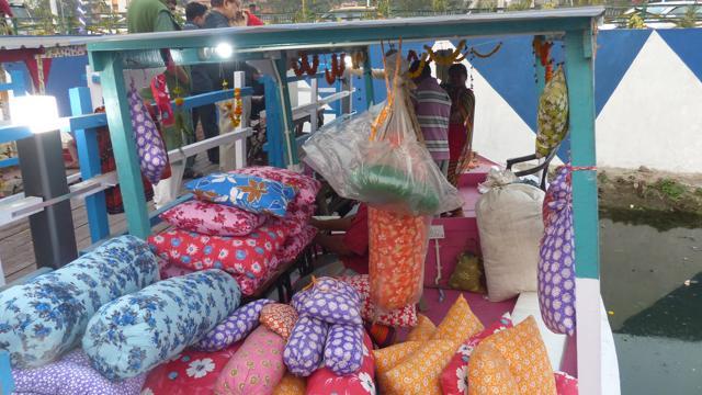 Loaded with pillows and blankets, this boat stands out at the floating market. (Tanmay Chatterjee / HT Photo)