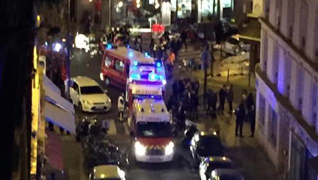 Police officers and rescue workers are seen at the Petit Cambodge restaurant after a shooting in Paris on November 13, 2015. (AFP File Photo)