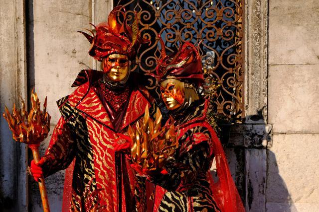 Masked revellers pose during the Venice Carnival. (REUTERS) Masked revellers pose during the Venice Carnival. (REUTERS)