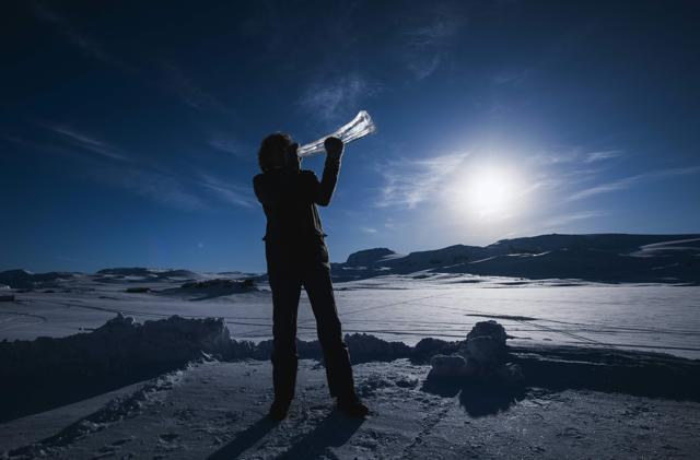 Terje Lsungset, the founder and artistic director of the Ice Music Festival, tests a musical instrument made of ice outside. (AFP) Terje Lsungset, the founder and artistic director of the Ice Music Festival, tests a musical instrument made of ice outside. (AFP)