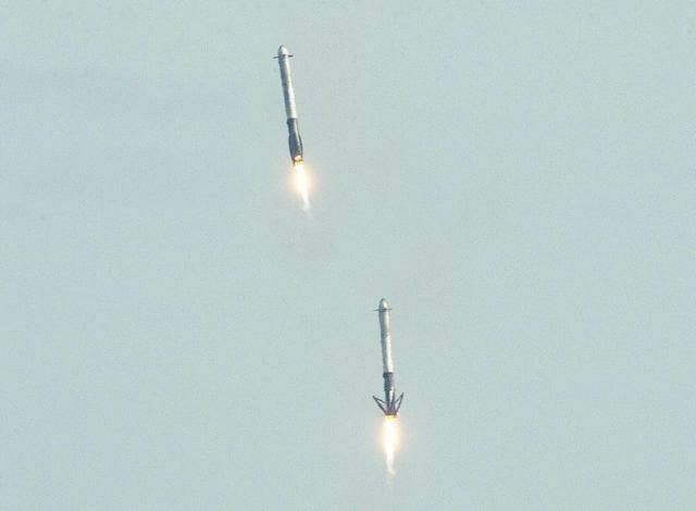 The SpaceX Falcon Heavy side booster rockets land at Kennedy Space Center, Florida, on February 6, 2018. (AFP) The SpaceX Falcon Heavy side booster rockets land at Kennedy Space Center, Florida, on February 6, 2018. (AFP)