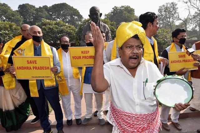 TDP MP from Chittoor N Sivaprasad, (foreground) and other members from Andhra Pradesh hold a demonstration demanding special package for their state, during the budget session of Parliament . (PTI) TDP MP from Chittoor N Sivaprasad, (foreground) and other members from Andhra Pradesh hold a demonstration demanding special package for their state, during the budget session of Parliament . (PTI)