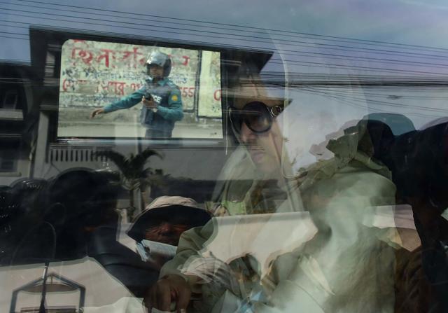 Khaleda Zia, Bangladesh's main opposition leader and Bangladesh Nationalist Party chairperson, is pictured arriving at a court to hear a corruption case against her in Dhaka on February 8. (AFP) Khaleda Zia, Bangladesh's main opposition leader and Bangladesh Nationalist Party chairperson, is pictured arriving at a court to hear a corruption case against her in Dhaka on February 8. (AFP)