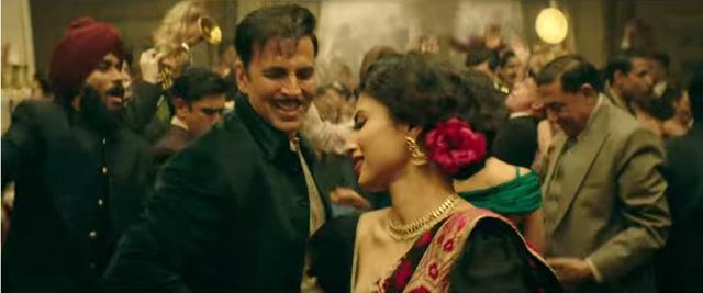 Mouni Roy with Akshay Kumar in a still from Gold.