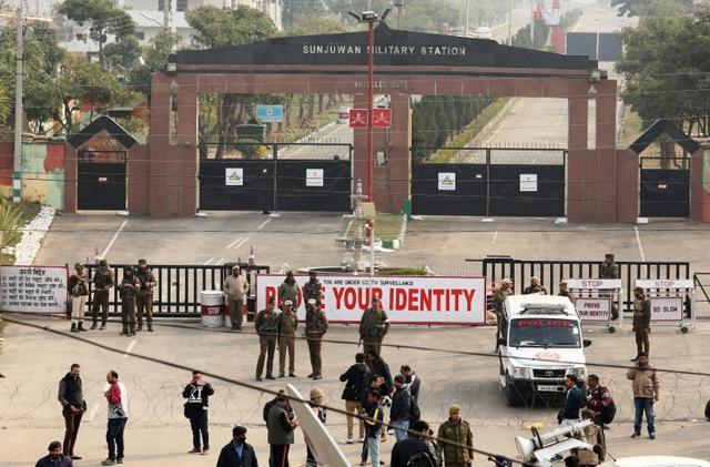 Police officers and soldiers stand guard outside an army camp after militants attacked the camp in Jammu. (Reuters Photo) Police officers and soldiers stand guard outside an army camp after militants attacked the camp in Jammu. (Reuters Photo)
