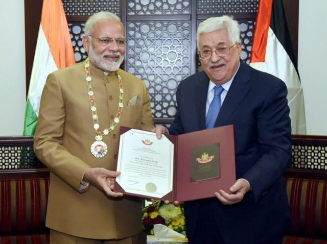 Prime Minister Narendra Modi receives the Grand Collar by Palestinian President Mahmoud Abbas in Ramallah on February 10. (PTI Photo) Prime Minister Narendra Modi receives the Grand Collar by Palestinian President Mahmoud Abbas in Ramallah on February 10. (PTI Photo)