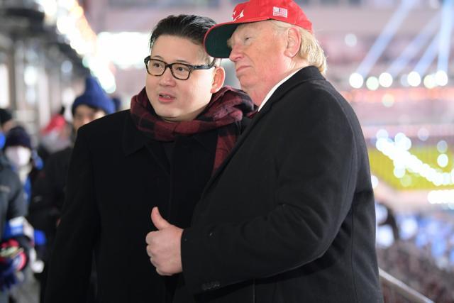 A man impersonating US President Donald Trump (R) and another impersonating Kim Jong-un pose in the stands during the opening ceremony of the Pyeongchang 2018 Winter Olympic Games at the Pyeongchang Stadium on February 9, 2018. (AFP) A man impersonating US President Donald Trump (R) and another impersonating Kim Jong-un pose in the stands during the opening ceremony of the Pyeongchang 2018 Winter Olympic Games at the Pyeongchang Stadium on February 9, 2018. (AFP)