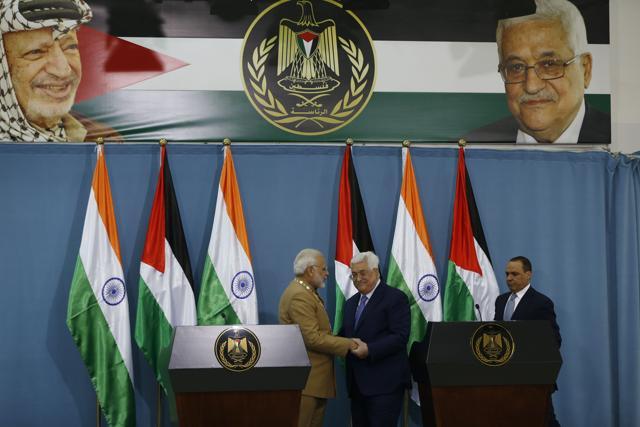 Palestinian president Mahmoud Abbas and Prime Minister Narendra Modi hold hands after their joint press conference following their meeting in the West Bank city of Ramallah on February 10. (AFP Photo) Palestinian president Mahmoud Abbas and Prime Minister Narendra Modi hold hands after their joint press conference following their meeting in the West Bank city of Ramallah on February 10. (AFP Photo)