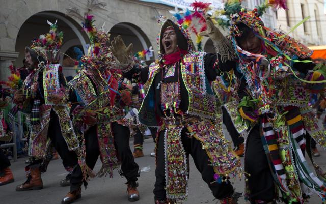 Traditional Thinku dancers perform during the Carnival. (AP)
