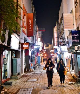 As commercialisation of residential units began around 2007, NDMC conceived a plan to redevelop Khan Market. It appointed a consultant to prepare a proposal. According to the plan, an underground parking was to be developed and elevated walkways connecting upper floors were to be constructed. Even after seven years, the plan is still on paper only. (Sanchit Khanna/HT PHOTO) As commercialisation of residential units began around 2007, NDMC conceived a plan to redevelop Khan Market. It appointed a consultant to prepare a proposal. According to the plan, an underground parking was to be developed and elevated walkways connecting upper floors were to be constructed. Even after seven years, the plan is still on paper only. (Sanchit Khanna/HT PHOTO)