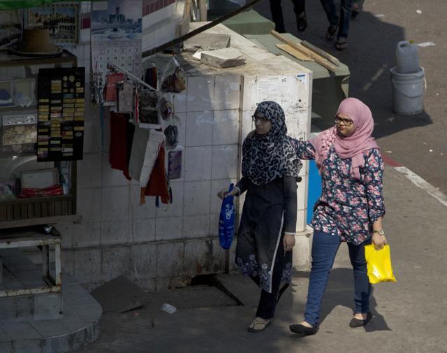 Two Muslim women take a stroll through downtown Yangon, Myanmar. (AP) Two Muslim women take a stroll through downtown Yangon, Myanmar. (AP)