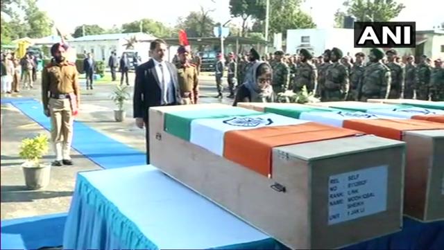 J-K chief minister Mehbooba Mufti and deputy CM Nirmal Singh at wreath laying ceremony of four Army personnel who lost their lives in Sunjuwan Army Camp attack. (ANI Photo) J-K chief minister Mehbooba Mufti and deputy CM Nirmal Singh at wreath laying ceremony of four Army personnel who lost their lives in Sunjuwan Army Camp attack. (ANI Photo)